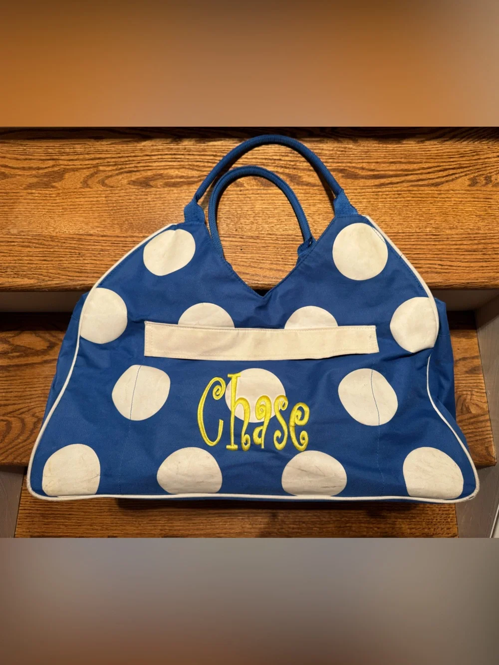Large blue Chase monogrammed zippered bag